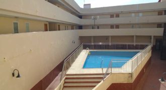 Apartamento con piscina comunitaria